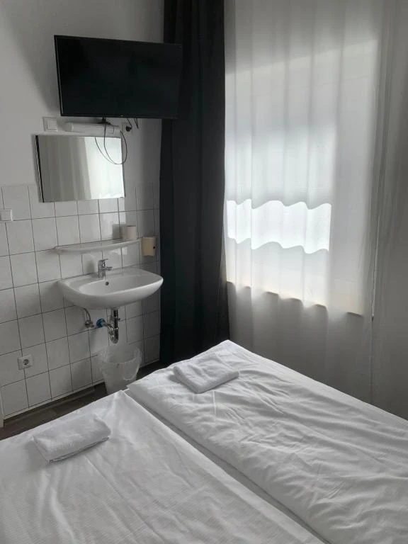 Zimmer mit Einzelbett im Hotel Bee Fang